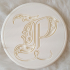 Coaster with letter 'P' image