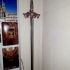 Sword wall stand in the shape of the cross of St James image