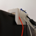 USB cable organizer on PC monitors image