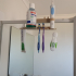 Shower toothbrush accessories hanger image