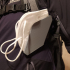 Mask rack on backpack strip image