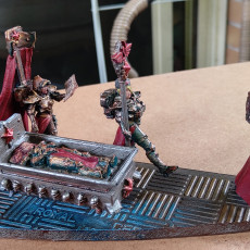 Picture of print of red sister  coffin   support ready