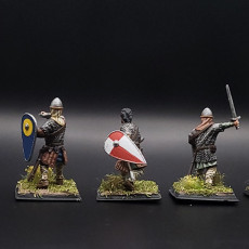 Picture of print of 11th century Armoured Warriors with swords x5