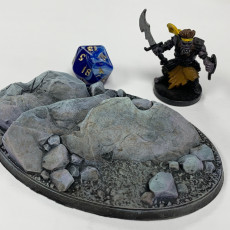 Picture of print of LegendGames 105x70mm Oval Rock Base for Warhammer, Age of Sigmar and similar games