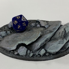 Picture of print of LegendGames 105x70mm Oval Rock Base for Warhammer, Age of Sigmar and similar games