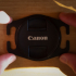 Lens cap holder for camera strap image