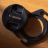 Lens cap holder for camera strap image