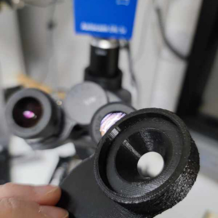 Spacer for microscope eyepiece and mobile phone