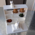 Desk shelf for Nespresso pods with a cat, a kitten, and a rat image