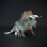 Triceratops resting dinosaur image