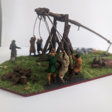 Picture of print of Traction Trebuchet with 12th century crew