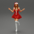 santa girl in Dress and hat Standing on One Leg image