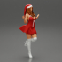 santa girl in Dress and hat Standing on One Leg image