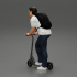 Man with backpack rolling on electric scooter image