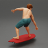 Young surfer man on surfboard riding the wave image