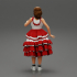 woman standing in frolic dress flamenco image
