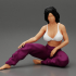 Pretty Woman In Bra And pants Sitting On The Floor image