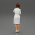 woman in a white bathrobe standing image
