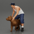 gangster homie in cap and short with his pitbull dog on the street image