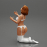 Sexy girl in bikini lingerie sitting on her knees image