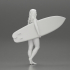 Attractive Young Woman Walking on Beach Holding Surfboard 2 image