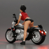 attractive girl on the motorbike in shorts and a mini jacket with curly hair image